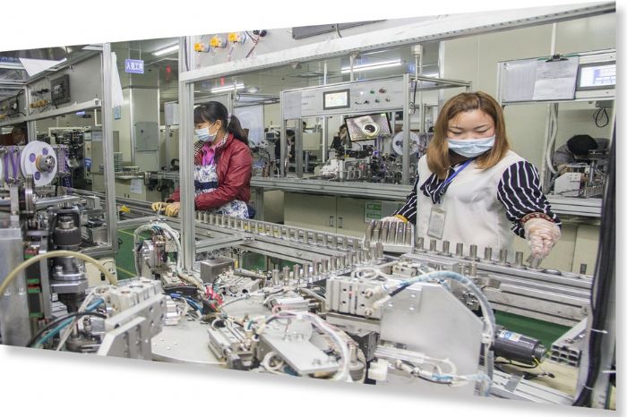 中欣维动力科技公司入壳工序。
